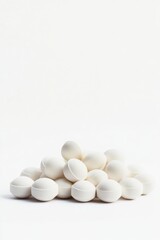 Pile of white round pills