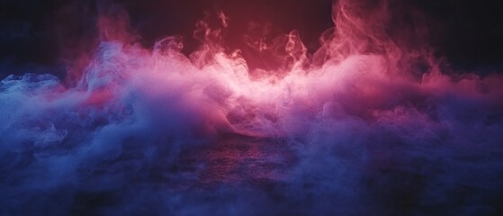 Obraz premium Abstract background with pink and blue smoke, creating a mystical and ethereal atmosphere.