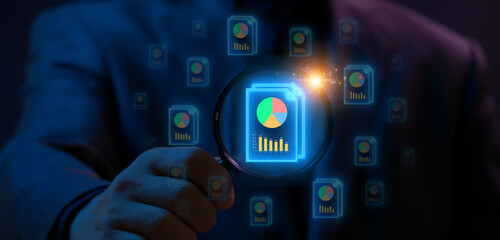 Data analysis concept. Market research, analytic. Business marketing analysis forecast sign. Businessman shows glowing neon line of magnifying glass focus on document icon on virtual screen.