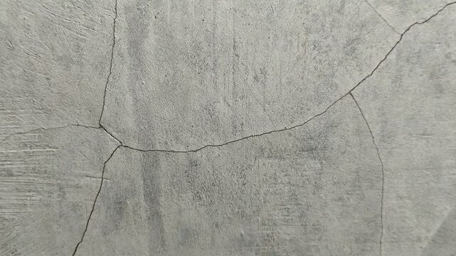 the house wall is cracked. The crack was caused by extreme weather