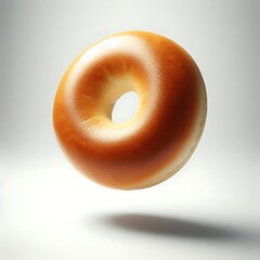 Mid-Air Bagel - A Golden-Brown Wonder, Perfectly Round with a Crisp Surface and Soft, Chewy Interior, Captured Against a Bright White Backdrop for Food Photography and Bakery Promotions.

