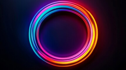 Obraz premium A vibrant, circular ring of neon lights in pink, blue, and orange hues against a dark background, creating a modern and dynamic visual effect.