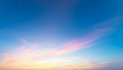 Fototapeta premium A colorful gradient of pink, purple, orange, and blue, painting a stunning picture of the sunset sky