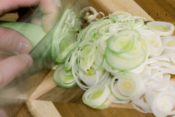 Scene of Cutting Leek with a Knife