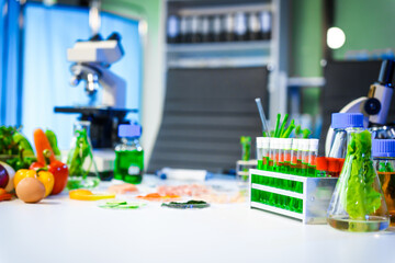 A detailed research concept in laboratory table setting, focused on food ingredients vegetables and meat. Test tubes, microscopes, lab equipment used to analyze nutritional extracts and vitamins.