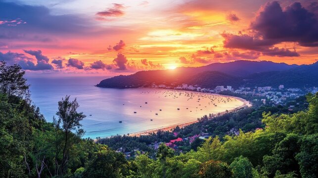 The stunning view of Patong Beach at sunset, with golden sands and vibrant nightlife in the background.