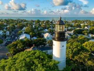 Key West Lighthouse and residential homes at sunset, Key West, Florida, United States.