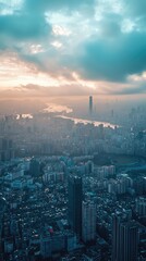 Aerial view of a vibrant cityscape at sunrise, showcasing skyscrapers, waterways, and dramatic cloudy skies.