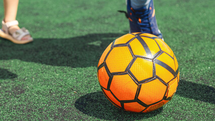 Football ball in the field. Horizontal sport theme.