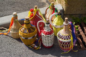 Decorated demijohns. Traditional vessels for wine and other drinks that are also used at folk festivals. South Moravia, Czech Republic.
