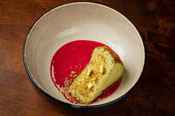 Pistachio cheesecake  in the berry sauce