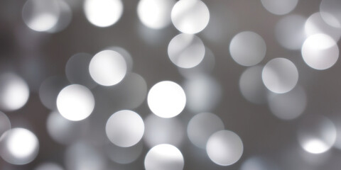 Silver abstract background with bokeh