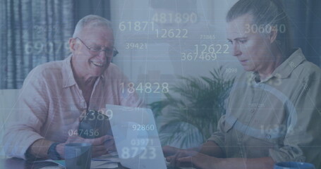 Image of data processing over caucasian senior couple using laptop