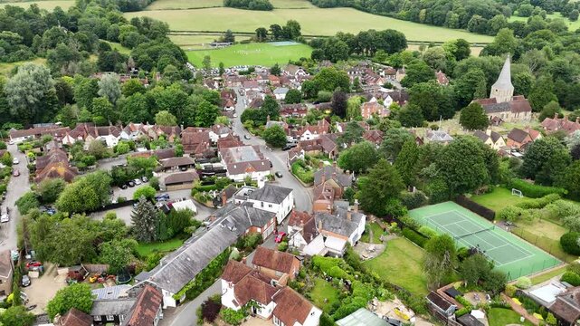 Shere Surrey UK quaint English Village centre aerial drone 4K footage