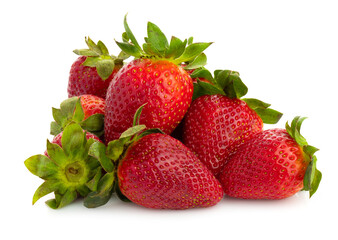 Fresh red strawberries and green leaves on a white background