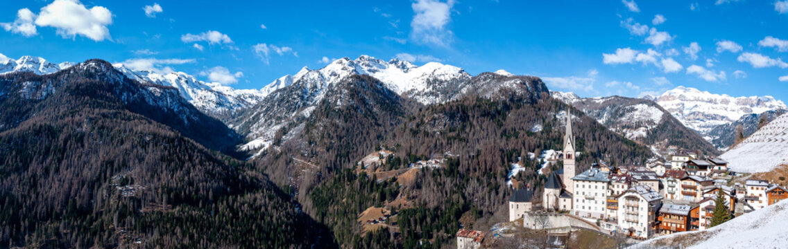 Panorama of Dolomires with Pieve di Livinallongo viilage in Italy