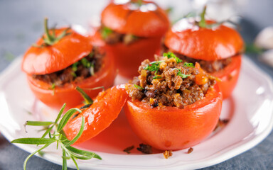 baked stuffed tomato with ground meat. Ideal for healthy eating and gourmet meal concepts