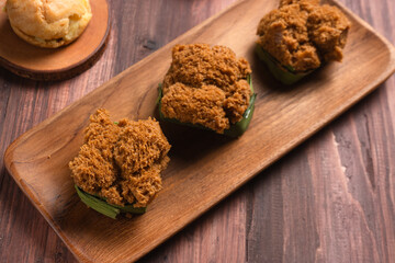 Bolu kukus gula merah (brown sugar steamed sponge cake). with copy space. perfect for recipe, article, catalogue, or any commercial purposes.