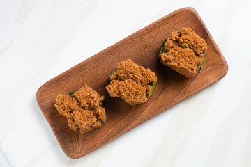 Bolu kukus gula merah (brown sugar steamed sponge cake). with copy space. perfect for recipe, article, catalogue, or any commercial purposes.