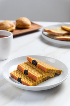 Lapis Legit with raisin pieces, Sliced ​​Thousand Layer Cinnamon Butter Cake, Indonesian Cake usually Served on Chinese New Year, Lebaran. Perfect for recipe, article, catalogue, commercial. 