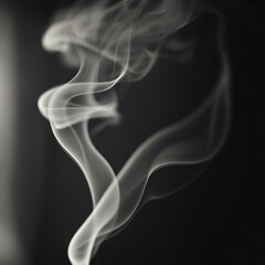 A black and white photo of smoke coming out of a window