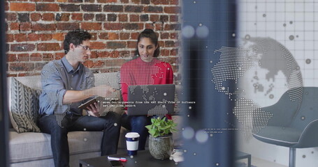 Image of globe and data processing over diverse business people in office