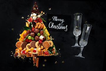 Creative sweet Christmas tree. Christmas concept. New Year Holidays background.