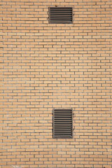 brick wall and a metal shutter window	
