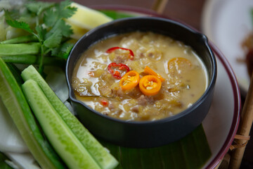 Set of Thai food, papaya salad or spicy salad somtum Thailand on the wooden table, thai spicy food