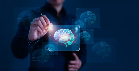 Man Pointing at Brain on Virtual Screen, Concept of Innovation and Inspiration