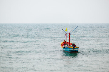 Fototapeta premium A small fishing boat waiting to set out for fishing.