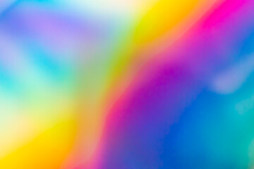Abstract blur holographic rainbow foil iridescent background