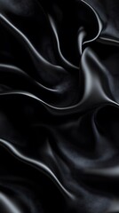 Fototapeta premium Smooth black fabric with elegant folds and curves.