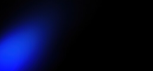 Obraz premium Abstract image featuring a gradient of deep blue light against a dark background, evoking a sense of calm and tranquility.