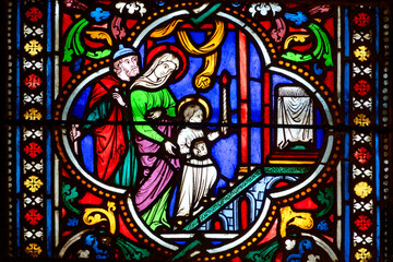 Stained glass (Nineteenth century) of The childhood of Jesus: Presentation of Jesus at the Temple. .
