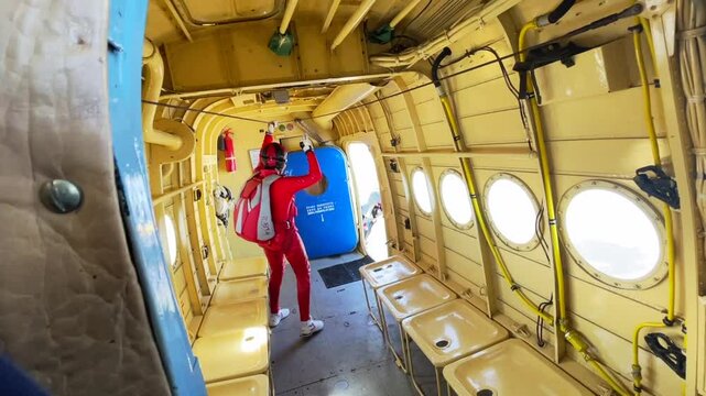 Parachutists jumping from a cargo aircraft