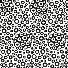 Black and white abstract seamless pattern. Hand drawn spots and dots background