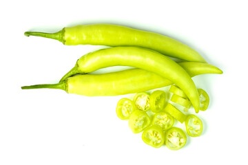 Heap of Fresh Big Green Chillies Pepper (Capsicum frutescens) whole and cross section isolated on white background with clipping path top view flat lay. 