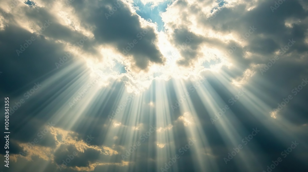 Poster A serene view of sunlight breaking through dark clouds, creating a dramatic interplay of light and shadow in the sky.