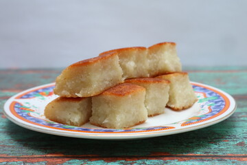 Wingko Babat, Traditional Indonesian Snack Made from Glutinous Rice Flour, Sugar, and Grated Young Coconut. Copy Space for Text