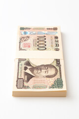白背景に一万円の札束