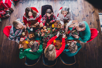 Above view full body portrait of big peaceful family enjoy food festive christmas time together flat indoors