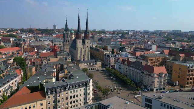 halle - saale - showing the iconic landmarks of the city center with its medieval buildings. Best aerial view flight static tripod hovering drone