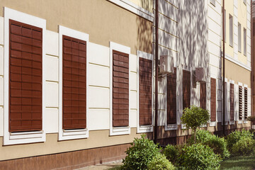 Window Shutters Shades for Safety Windows in War time. War and Sorrow. Window Security in Wartime. Blinds Outside to Protect against Shards of Broken Window in Ukraine War.