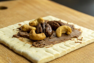Puff pastry with pecan and cashew.Dessert.food concept