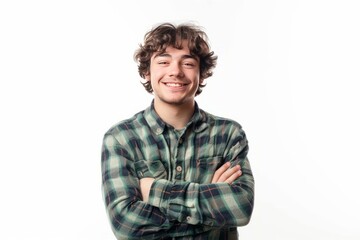 Image of a joyful young man with arms folded, isolated on white , background blur