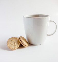 Cup of coffee with Round  Christmas cookies. Vanilla or butter sandwich cookies.