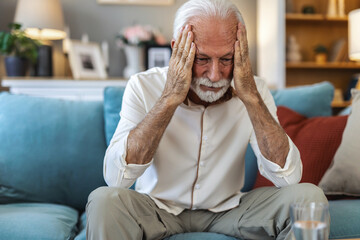 Home, senior and man with pain for headache, muscle tension and emergency for hypertension. House,...