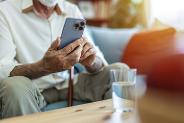 Laugh, cellphone and senior man texting for communication, digital conversation and online chat. Technology, notification and mobile app for male person, smile and social media for comedy streaming.