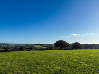 Obraz premium Rural Cornish field and blue sky. 